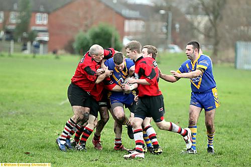 Hollinwood’s Matthew McCullough is stopped in his tracks. 