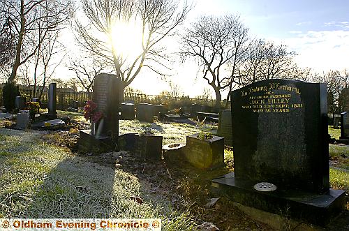 SUNLIGHT streams over the resting place of Jack and Lily Lilley at Failsworth Cemetery 