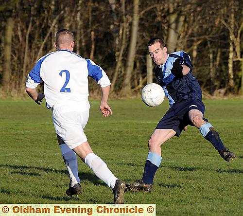 FOCUSED: Steve Barrow, of Chaddertonians, attempts to bring the ball under control in the Lancashire FA Cup tie against Highgrove. FOCUSED: Steve Barrow, of Chaddertonians, attempts to bring the ball under control in the Lancashire FA Cup tie against Highgrove.