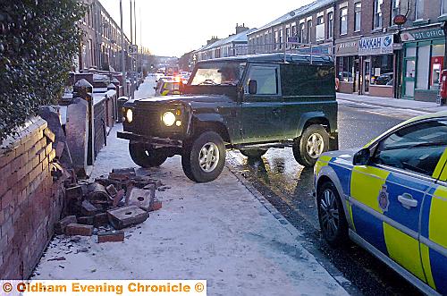 CRASH . . . this Land Rover Defender came to grief in the icy conditions this morning when it collided with a garden wall on Lees Road, Clarksfield 