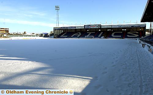 Snow covered pitch at Oldham Athletic's Boundary Park ground. Snow covered pitch at Oldham Athletic's Boundary Park ground.