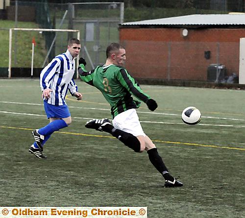 NEIL Hardman, of Highfield United, shapes to shoot at the Limeside Athletic goal. 