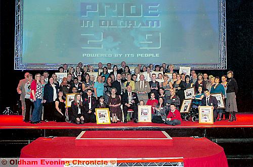 WHAT A DAY! . . . All the Pride in Oldham finalists took to the stage after the ceremony to show off their awards WHAT A DAY! . . . All the Pride in Oldham finalists took to the stage after the ceremony to show off their awards