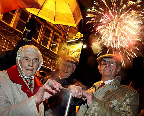 PUSHING the plunger . . . (from left) Clara Shaw, Jack Highton and Stanley Stewart light up Delph
