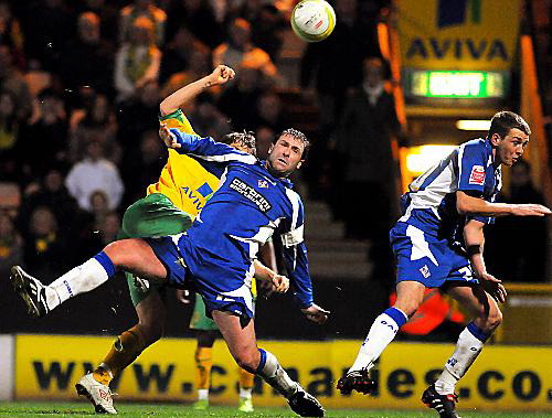 SEAN Gregan attempts to block a Norwich City cross 