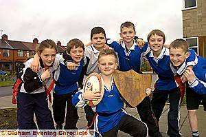 LYNDHURST Primary School won the Counthill cluster schools tag rugby competition organised by Garry Hepworth after enjoying six weeks of training with Sports Development officer Danny Knight.
Team captain Aiden Schofield (foreground) is pictured with left to right: Jade Winterbottom, Kane Fitton, Joshua Tindall, Brandon Heyes, Harry McCormick and Ellis Robinson. LYNDHURST Primary School won the Counthill cluster schools tag rugby competition organised by Garry Hepworth after enjoying six weeks of training with Sports Development officer Danny Knight.
Team captain Aiden Schofield (foreground) is pictured with left to right: Jade Winterbottom, Kane Fitton, Joshua Tindall, Brandon Heyes, Harry McCormick and Ellis Robinson.