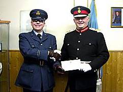 SHAKE on it . . . the Lord Lieutenant presents a cheque for £500 to Flt Lt Mike Holroyd SHAKE on it . . . the Lord Lieutenant presents a cheque for £500 to Flt Lt Mike Holroyd