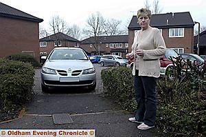 NO way through . . . Ann Cowen points out how cars continually block the path to her home NO way through . . . Ann Cowen points out how cars continually block the path to her home