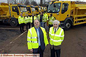 TEAMWORK .... Councillor Mark Alcock (front left) and Tony Noblet, pictured with one of the gritting teams. 
