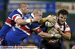 THE impressive Chris Baines keeps Oldham going forward 