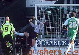 ALL-SQUARE: Athletic striker Lee Hughes looks on as Terrell Forbes’ header loops over Yeovil goalkeeper Josh Wagenaar. 

