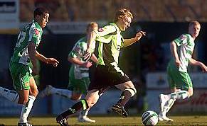 CATCH ME IF YOU CAN: Chris Taylor sprints towards the edge of the Yeovil penalty area. 


