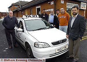 GROUND to a halt . . . managing director of Borough Taxis Fazal Rahim (right) with unhappy staff
GROUND to a halt . . . managing director of Borough Taxis Fazal Rahim (right) with unhappy staff