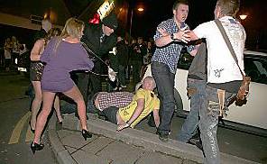 SCUFFLES . . . trouble flares outside the Tokyo club 