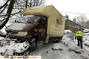 CRUNCH . . . a bread van hits the wall in Mount Lane, Dobcross 
