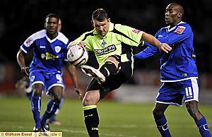 Dean Windass gets between two Leicester defenders before his stint in goal. 