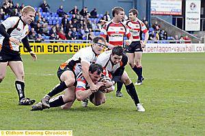 ROBERT Roberts makes the hard yards. 