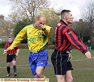 Warwick's Nicholas Foran and Bridge's Mike King in an aerial challenge. Warwick's Nicholas Foran and Bridge's Mike King in an aerial challenge.