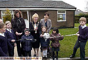 Opening of new community bungalow at St. Anne's School, Lydgate by Chairman of Saddleworth Parish Council Pat Lord. Also on pic with pupils are Tess Wiley (left) from the National Lottery and deputy head teacher Jane Fraser (right). Opening of new community bungalow at St. Anne's School, Lydgate by Chairman of Saddleworth Parish Council Pat Lord. Also on pic with pupils are Tess Wiley (left) from the National Lottery and deputy head teacher Jane Fraser (right).