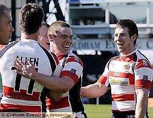 Oldham's Thomas Coyle celebrates his hat trick