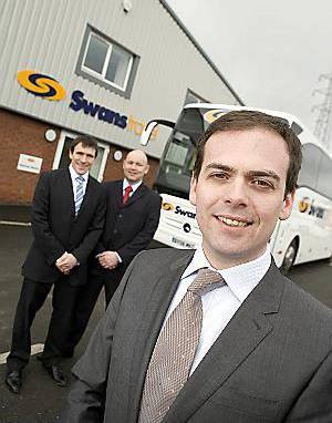IT’S a deal . . . managing director Kieran Swindells, with, back left, Peter Treadwell from the Royal Bank of Scotland, and Paul Warren of Lombard IT’S a deal . . . managing director Kieran Swindells, with, back left, Peter Treadwell from the Royal Bank of Scotland, and Paul Warren of Lombard