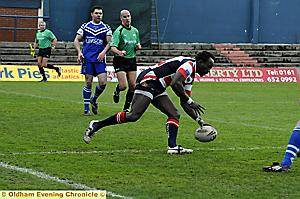 LUCAS ONYANGO opens the scoring for Oldham. Pictures by: CHRIS SUNDERLAND. 