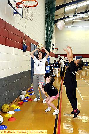 FUTURE stars... coach Katie Wretham with Lauren Stanley (centre) and Savannah Franklin-Goddard 