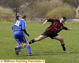 NEAT FEET: Diggle’s Wayne Broadbent turns inside Christian Neild. 