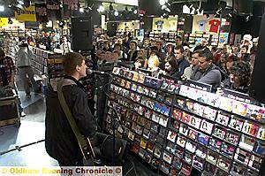 EXCLUSIVE performance . . . shoppers catch Twisted Wheel live 
