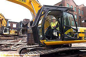 OLDHAM’S deputy council leader Councillor Jackie Stanton got behind the controls of this big boy’s toy to help with the demolition of the Albert Mill, Derker. 