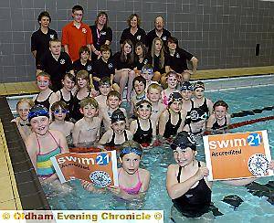 MAKING waves . . . Katie Mills (left) and Katie Leggett show off the new charter mark with other club members
MAKING waves . . . Katie Mills (left) and Katie Leggett show off the new charter mark with other club members