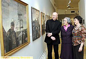 PICTURE PALACE . . . Gallery Oldham Curator Stephen Whittle observes some of Roger Hampson’s paintings with Mr Hampson’s wife, Betty and daughter Caroline Walmsley. Picture: CHRIS SUNDERLAND PICTURE PALACE . . . Gallery Oldham Curator Stephen Whittle observes some of Roger Hampson’s paintings with Mr Hampson’s wife, Betty and daughter Caroline Walmsley. Picture: CHRIS SUNDERLAND