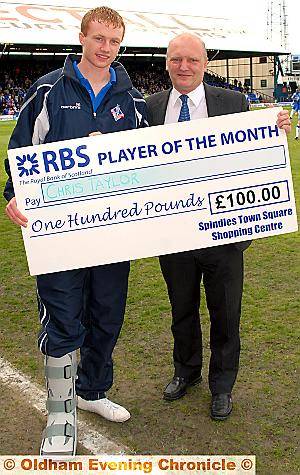 CHRIS TAYLOR may be injured at the moment, but at least he had two reasons to smile at the weekend. The winger received the Latics player of the month award for April from Spindles Town Square manager Mike Flanagan, and was included in the PFA’s League One team of the season. 