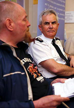 HELPING . . . an ADS client and Chief Constable Peter Fahy 