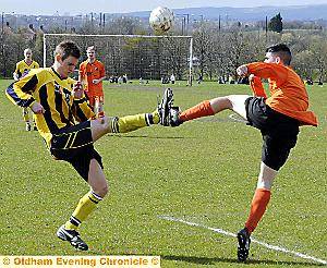 TOE TO TOE: Chaddy End FC’s Ryan Bladwin (left) and David Spence, of Oddies, battle for the ball. 