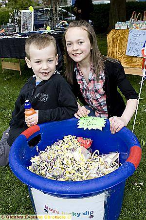 LUCKY dip . . . James and Anna Buckley hope to win a prize