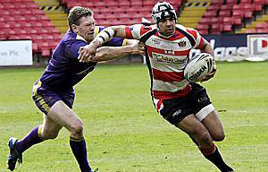 OUT OF MY WAY: Marcus St Hilaire looks to evade a Gateshead Thunder opponent.