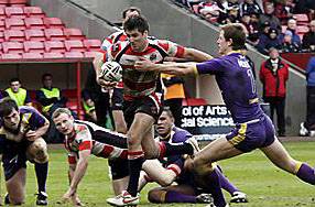 DAVE ALLEN makes a surge for Oldham