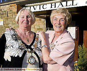 New chairman of Saddleworth Parish Council councillor Alma McInnes with outgoing chairman councillor Pat Lord 