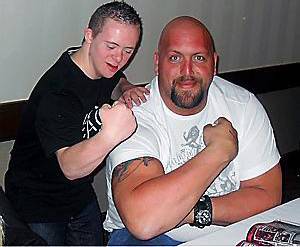 FIRM friends. . . Jason with his new pal, wrestler Big Show FIRM friends. . . Jason with his new pal, wrestler Big Show