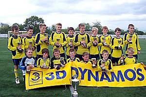 CUP OF CHEER: 3D Dynamos under-11s ‘T’ are all smiles after retaining the Tameside and District Junior League’s Challenge Cup. 