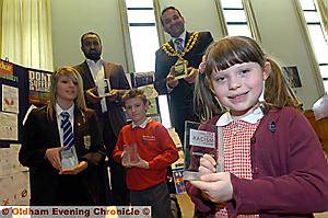 WELL DONE . . . pictured, from left, Katie Townsend (Our Lady’s); Tariq Rafiq (project manager OREP); Kurtis Beech (Blackshaw Lane Primary); Oldham Mayor, Councillor Shoab Akhtar; Sophie Temesi (St John’s Infant and Nursery, Failsworth). Representatives from St Hugh’s and Corpus Christi Schools not on picture WELL DONE . . . pictured, from left, Katie Townsend (Our Lady’s); Tariq Rafiq (project manager OREP); Kurtis Beech (Blackshaw Lane Primary); Oldham Mayor, Councillor Shoab Akhtar; Sophie Temesi (St John’s Infant and Nursery, Failsworth). Representatives from St Hugh’s and Corpus Christi Schools not on picture