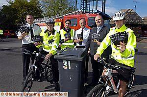Launching the campaign (from the left) PCSO Adam Riley, council recycling manager Mark Husdan, neighbourhood inspector Dave Stopford, Councillor Mark Alcock and community safety fire officer Simon Wheelwright 