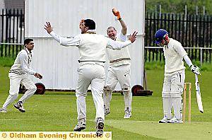 CELEBRATION TIME: Austerlands’ Adam Young is caught off the bowling of Mohammed Shazad. Picture: CHRIS SUNDERLAND. CELEBRATION TIME: Austerlands’ Adam Young is caught off the bowling of Mohammed Shazad. Picture: CHRIS SUNDERLAND.
