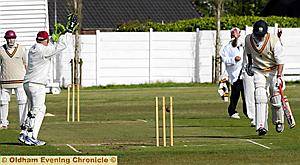 MIX-UP: Werneth professional Pierre Joubert is run out against Crompton.