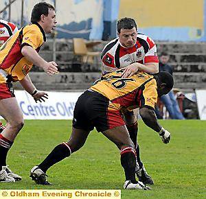 GOTCHA: Richard Mervill (right) stops Hunslet’s Nicko Slain in his tracks. 