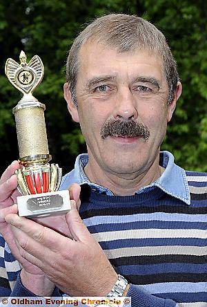 Trevor Lewis with his Trophy. 