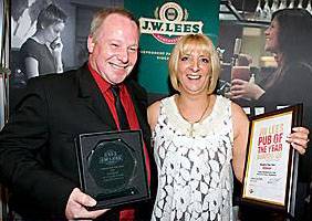 CHEERS . . . Brian and Angela Shuttleworth, from the Hunt Lane Tavern, celebrate their win CHEERS . . . Brian and Angela Shuttleworth, from the Hunt Lane Tavern, celebrate their win