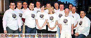 Sporting their new T-shirts are (back row, from left to right) Mike Coulter, Nigel Hill, Peter Holt, Tom Aspin – club chairman, Gordon Beverley, Phil Wiggett - president, Ian Moore, Paul Annersley, Dave Cooper, (fron row, from left to right) Dave MacDougall, NSPCC event organisers Amanda Flynn and Natalie Coverley, Kevin Ridings and Gary Brookfield. 