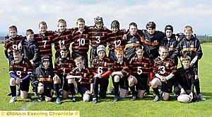 IN IT TOGETHER: Oldham Service Area under-12s defeated their Salford counterparts 10-6. 